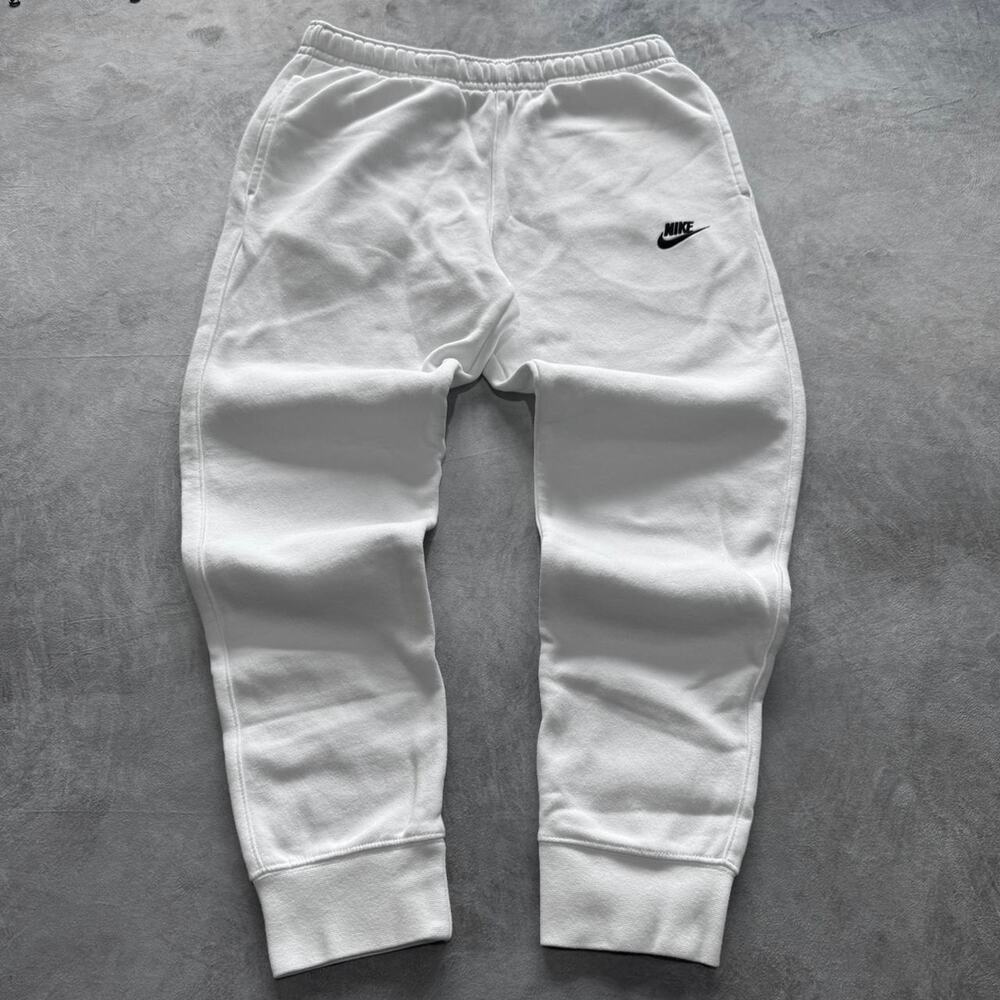 White nike joggers with black